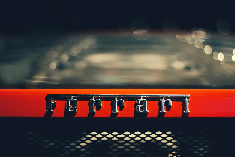 a red car with a black grill guard and some lights