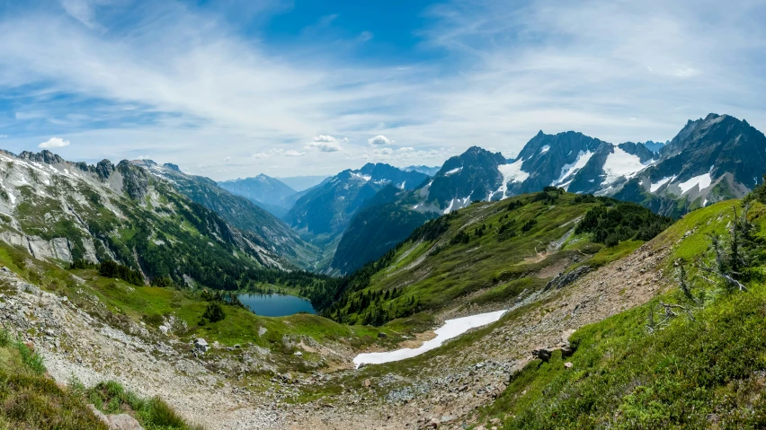 a landscape view of some mountain ridges and lakes