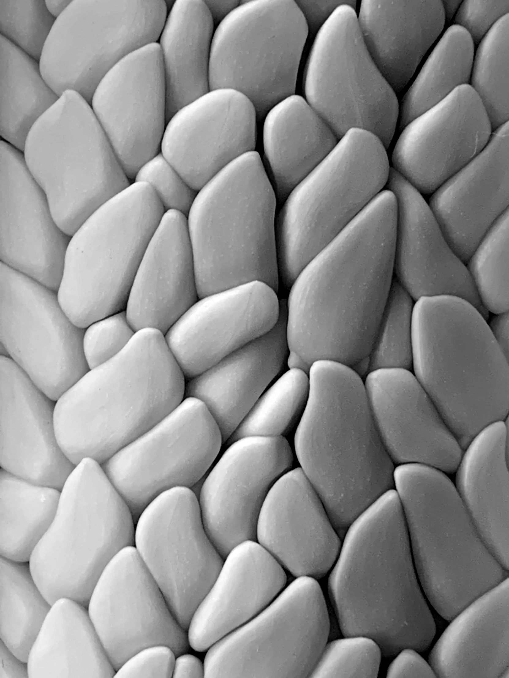 close up of white pebbles made from porcelain