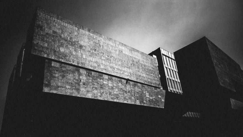 a black and white image of a building