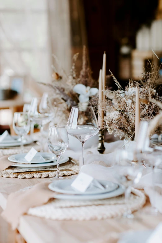 some white and blue tables cloths and white dishes