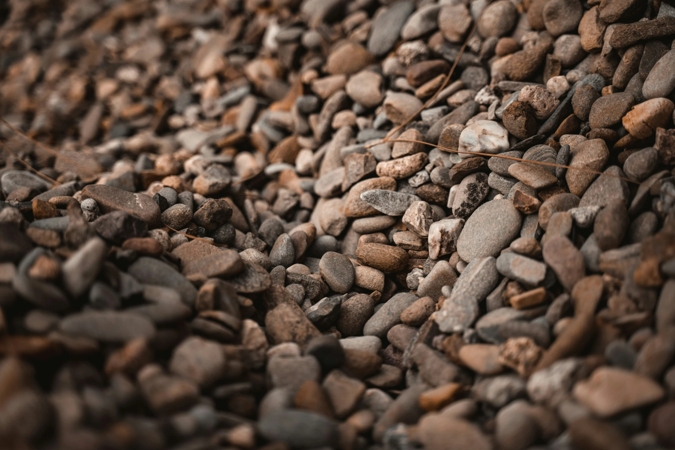 brown and black rocks textured together on top of each other