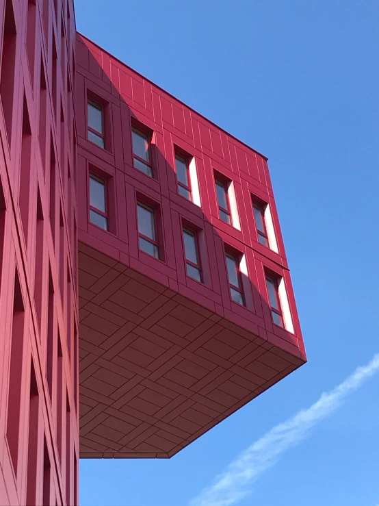 the top side of a building under a blue sky