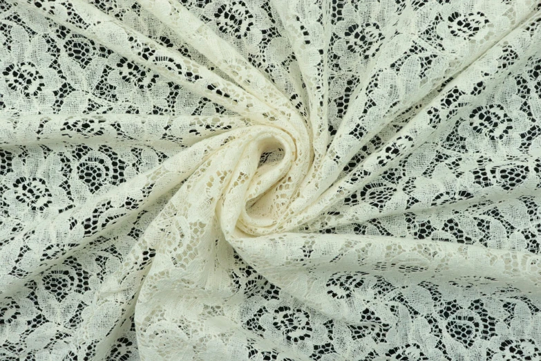 close up view of a white and black lace fabric