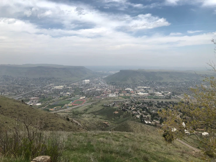 the view from the top of the hill of an urban area