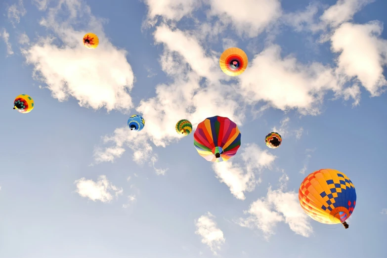 a bunch of  air balloons that are in the sky