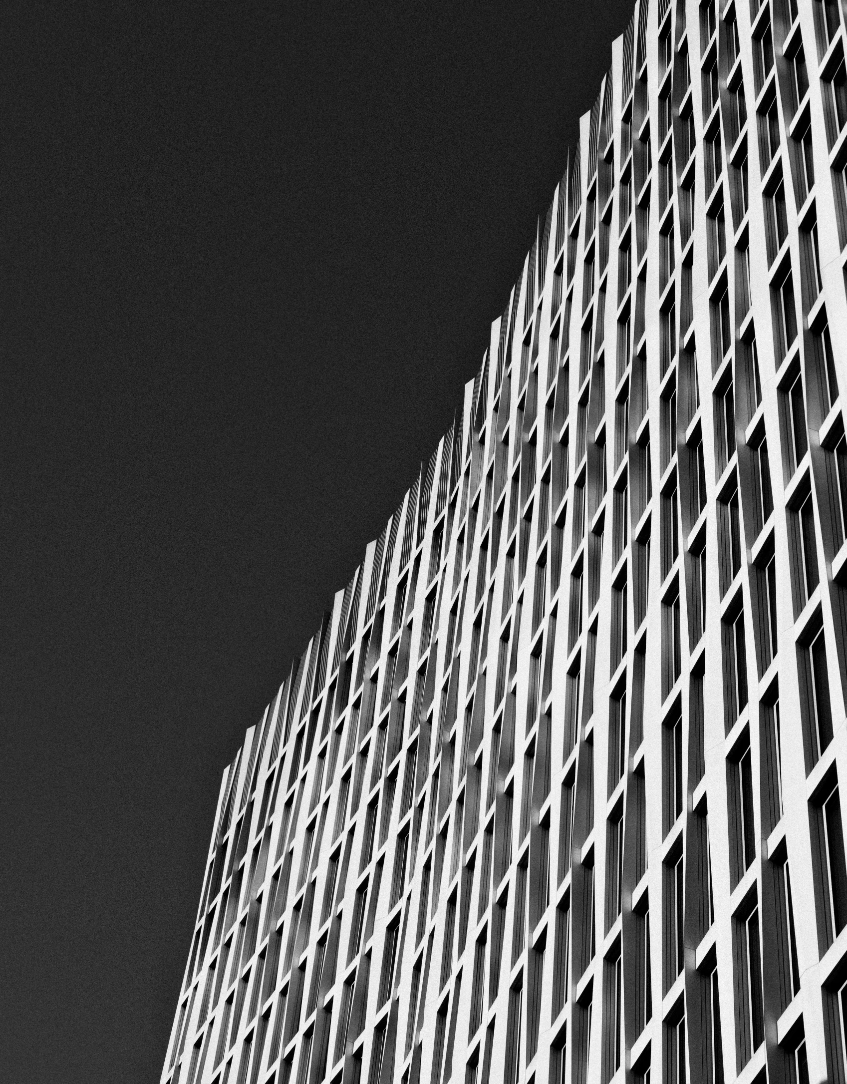 a white and black po of a building's exterior