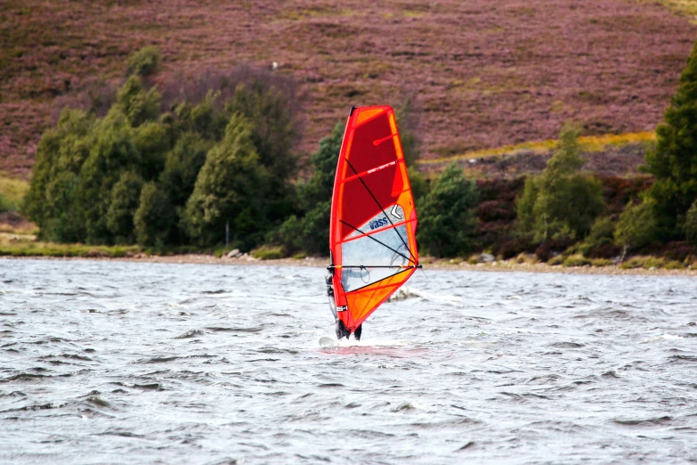 a person on a water ski in the water