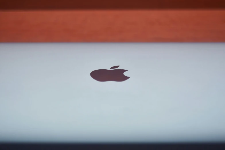 a apple laptop with the logo visible on it