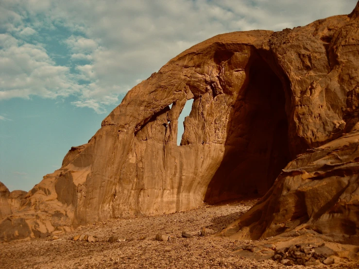 there are two arch shaped stone structures in this po