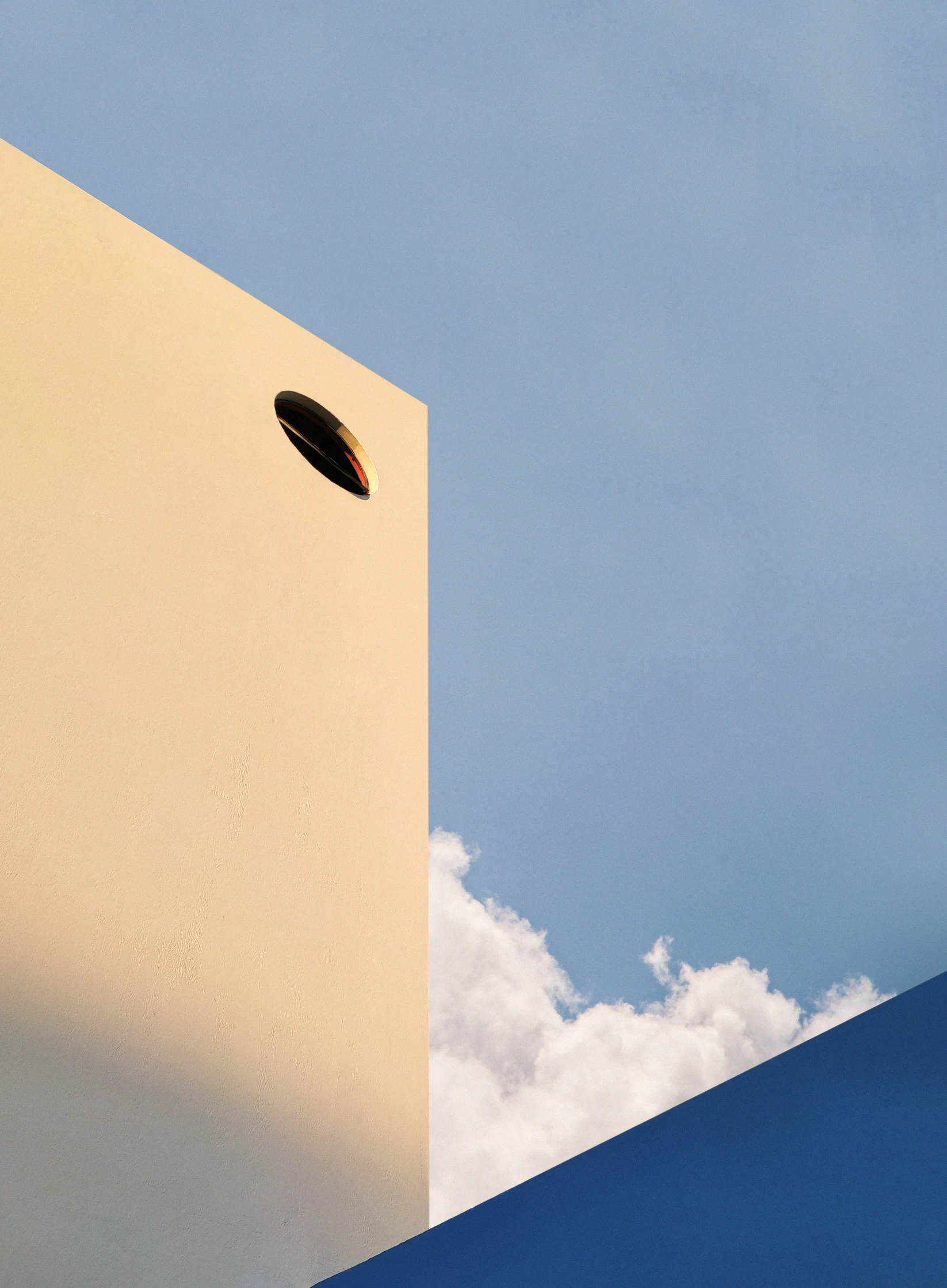 the sky and the building are in the same area