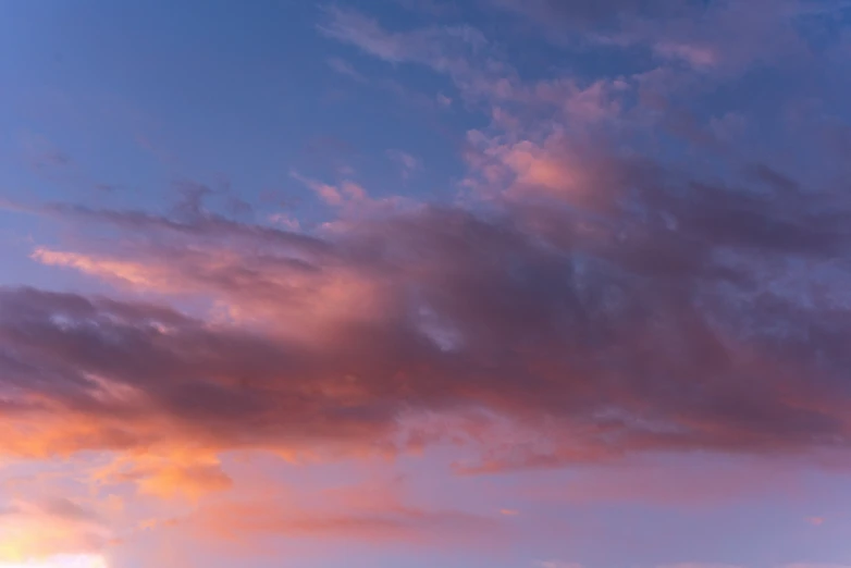 a plane flying high up into the sky