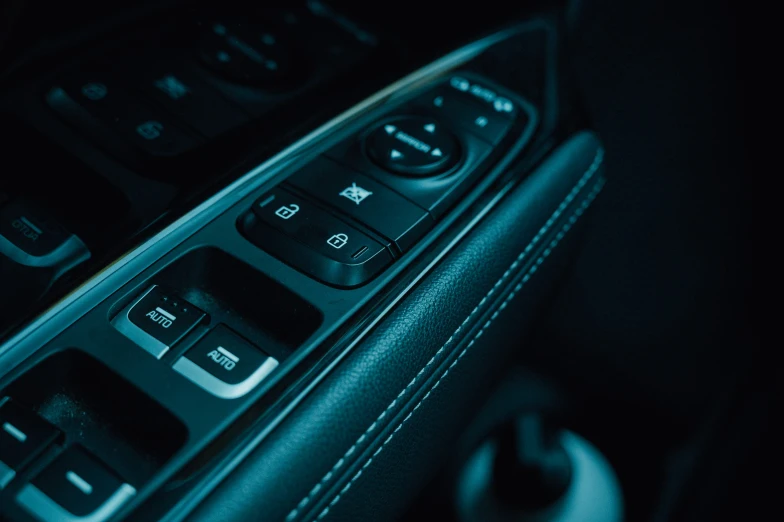 the controls in the center console of a car