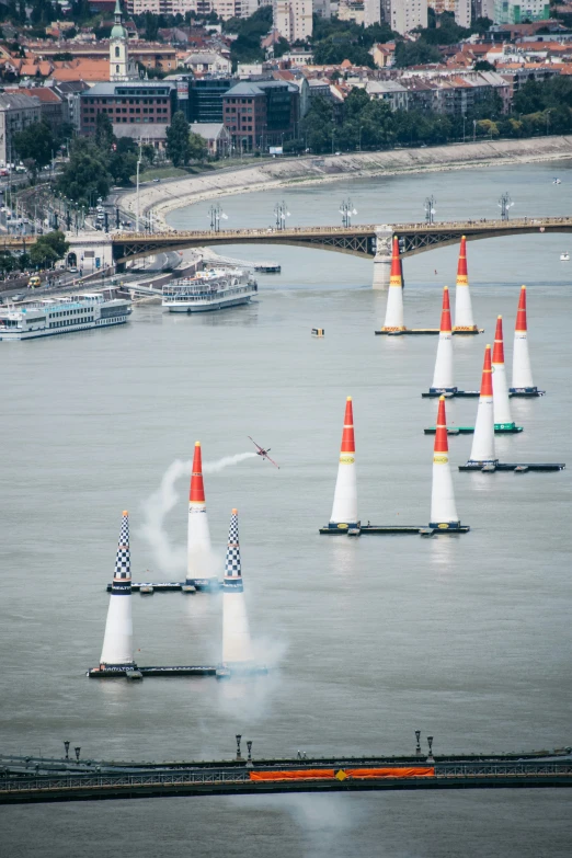 multiple cones are set up across the water