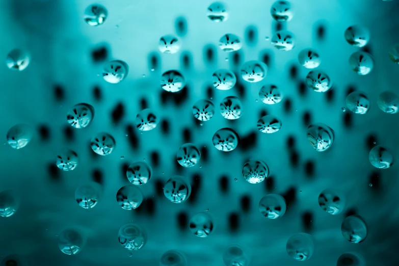 water droplets are being viewed from inside a container