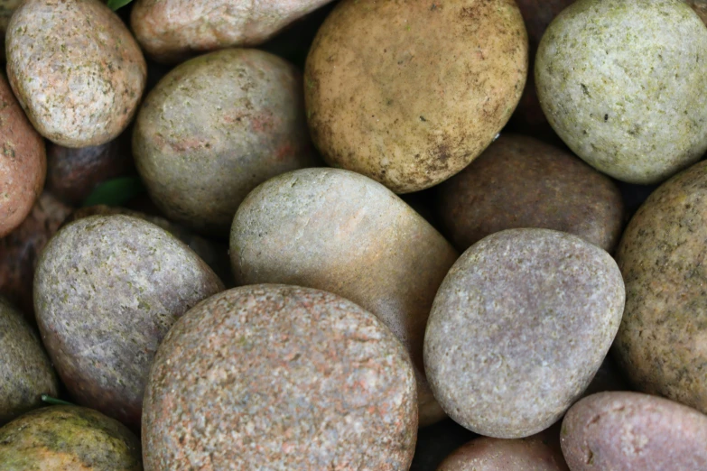 some rocks in a circle of different colors