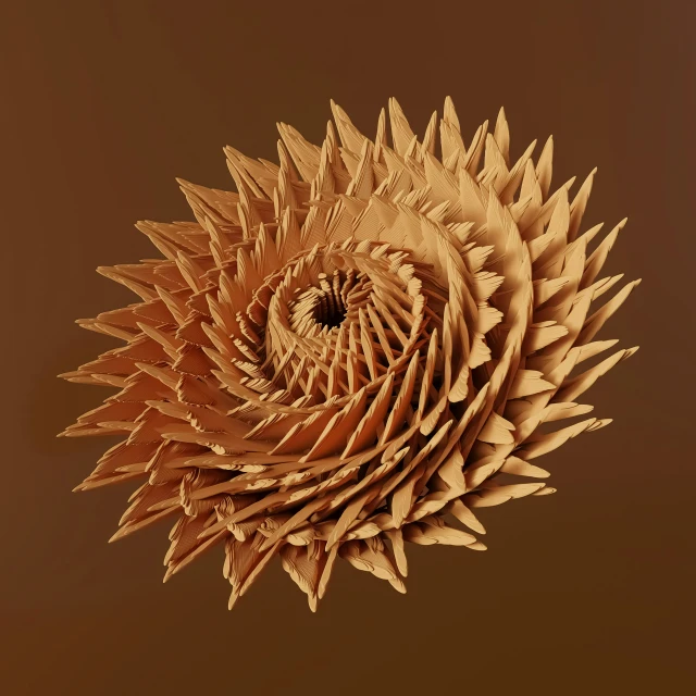 a picture of an abstract, gold sculpture on a tan background