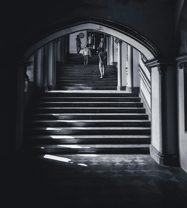 a person walking up a long set of stairs