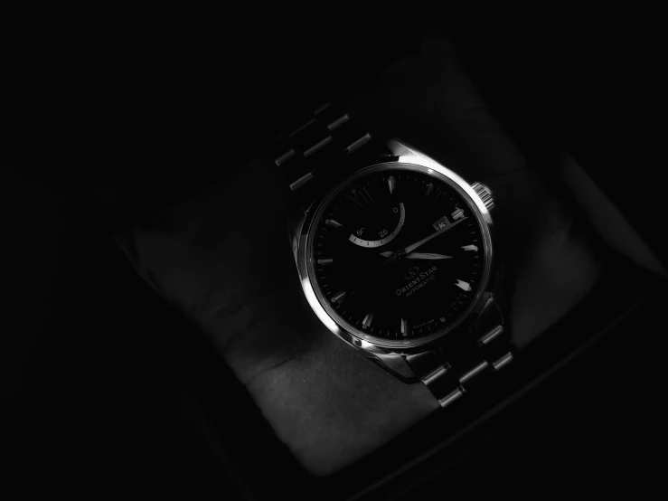 black and white pograph of a rolex watches