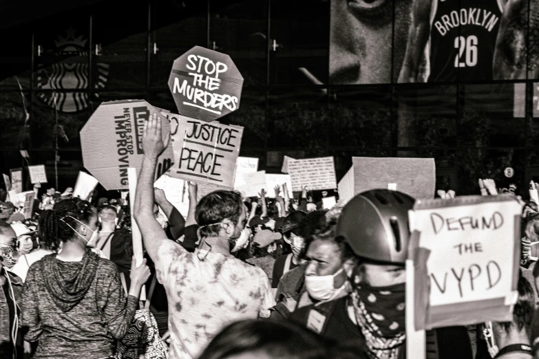 black and white po of protesters at occupy rally