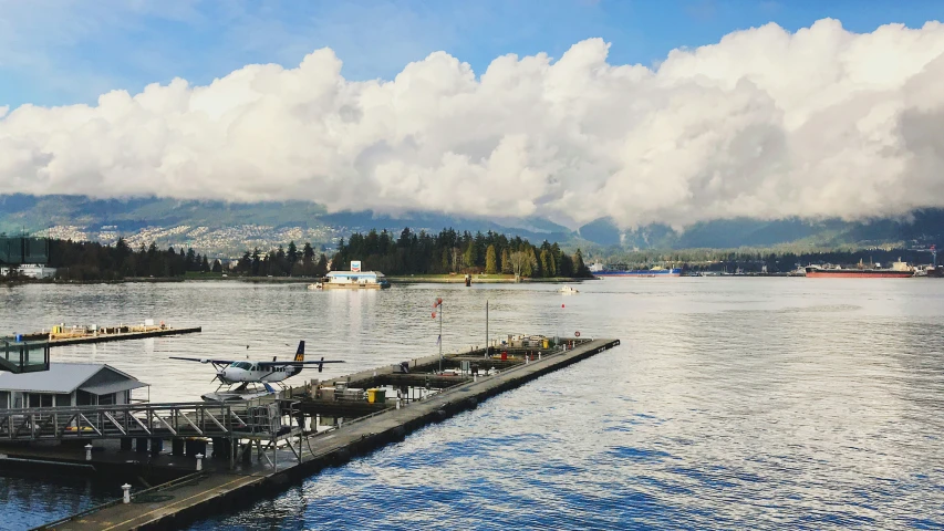 there is a large lake with boats on it