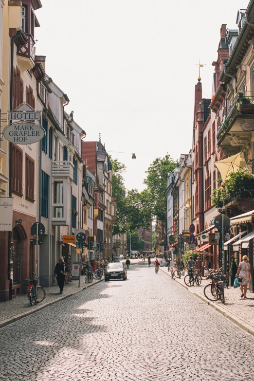 a person is riding a bike through an empty street