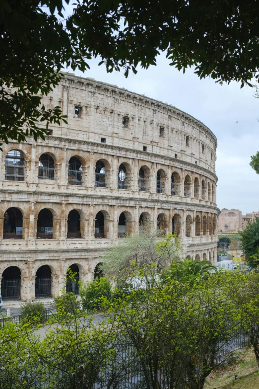 the roman collisure is sitting on top of the hill