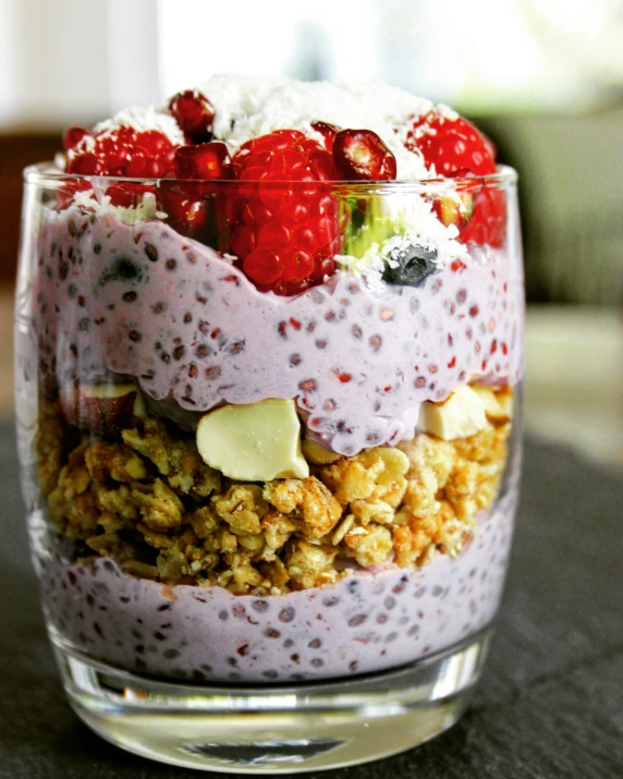 a bowl of cereal topped with fruits and nuts