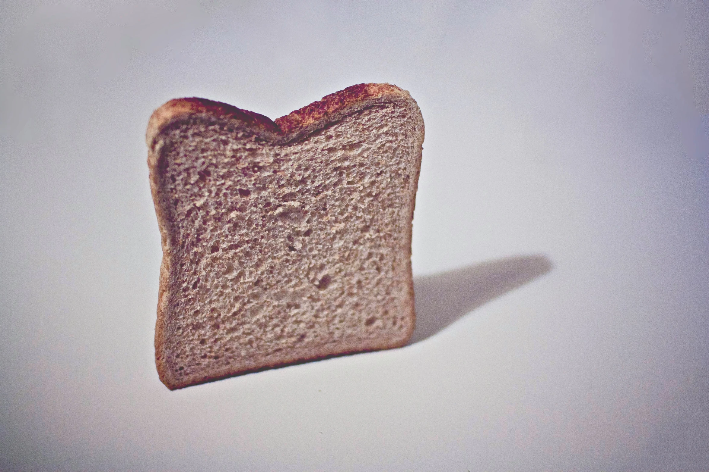 a close up view of a toasted bread slice