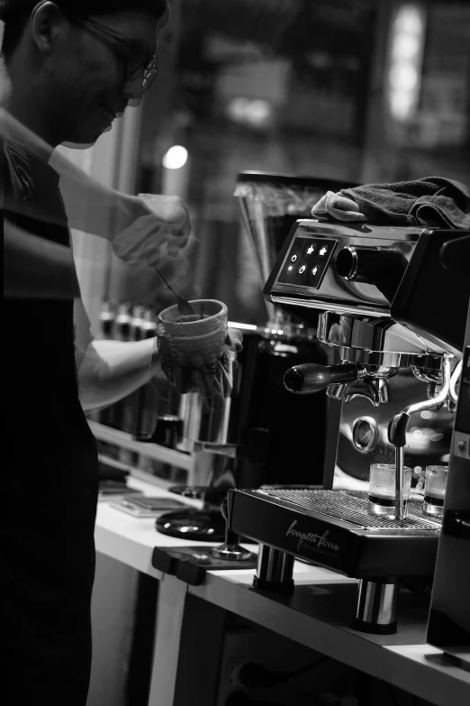 a bariimatori and coffee machine in a restaurant