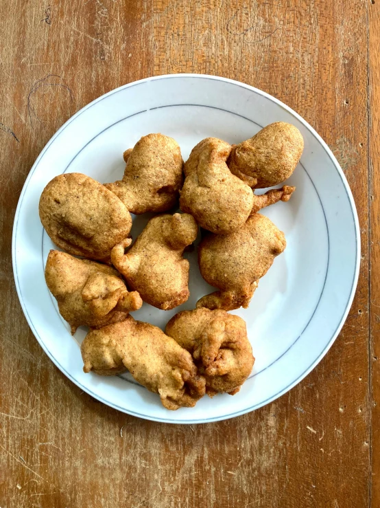 a white plate with some biscuits on it