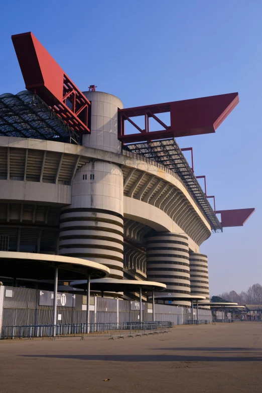 a building with large metal windows near the ground