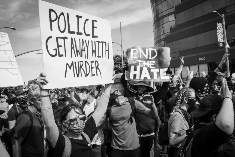 protestors outside the metropolitan police headquarters during the ferguson march