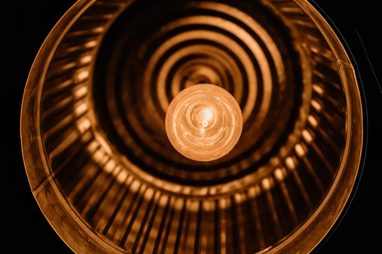 a brown and white image shows a lamp