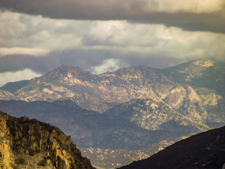 the mountain range near a city and a road