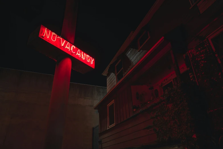 the outside view of an apartment building at night