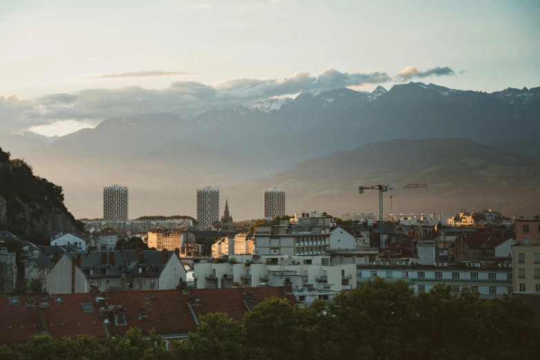 the city in the distance is surrounded by mountains