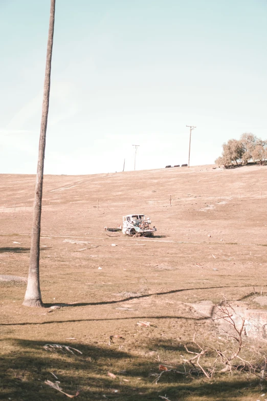 a truck is parked in an open field