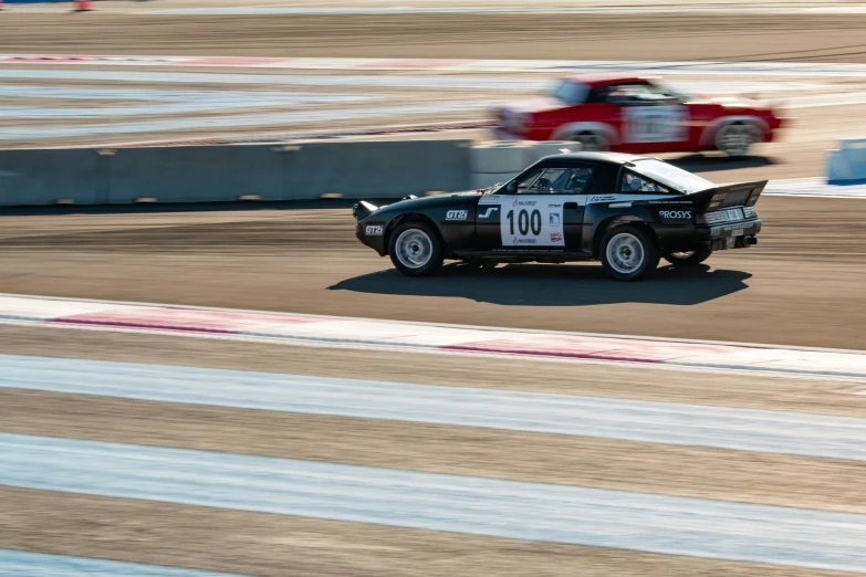 there is an old racing car that looks like it could race around the track