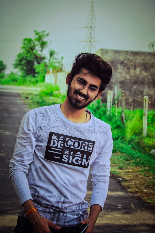 a man wearing a white shirt with words written on it