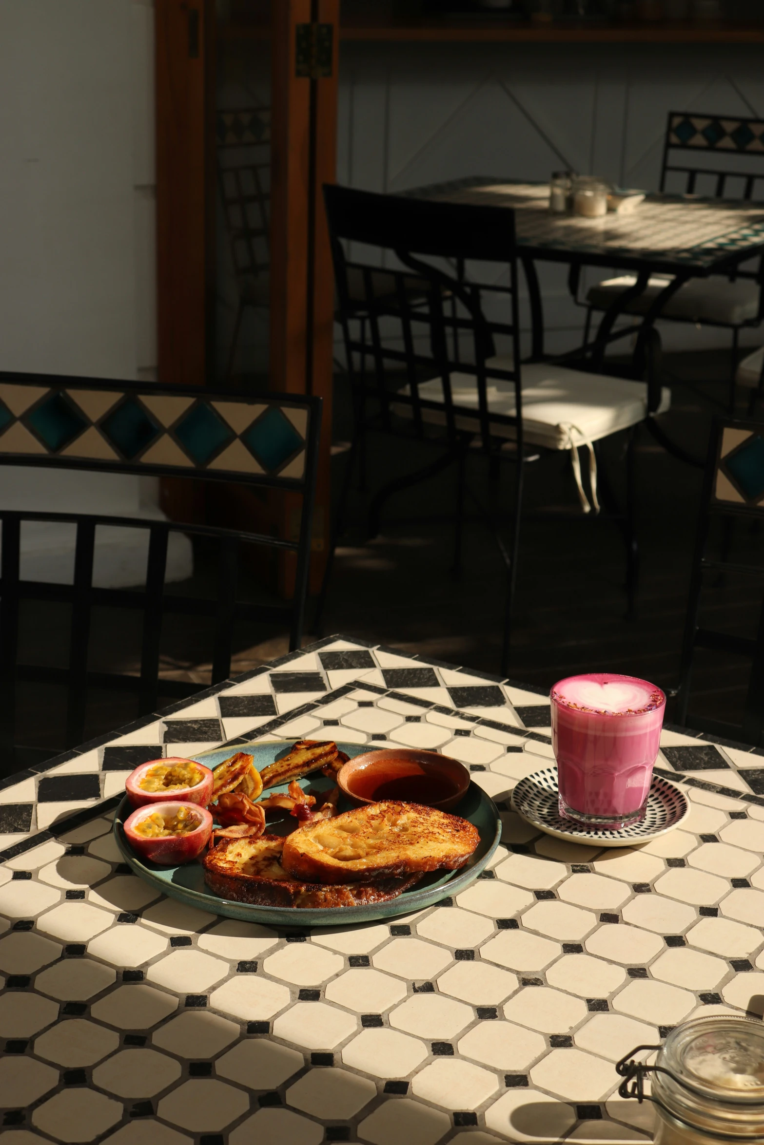 a breakfast plate that is on a table