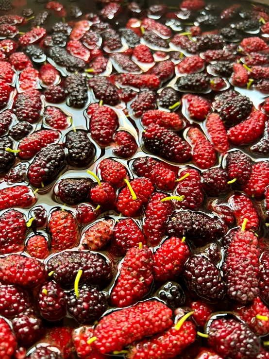 fresh raspberries are frying in the pan