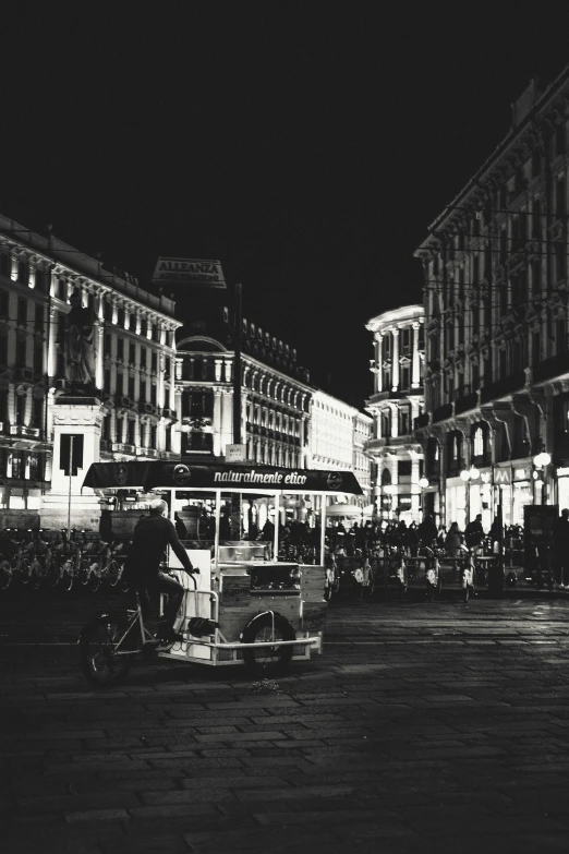 trolley in a city lit up at night