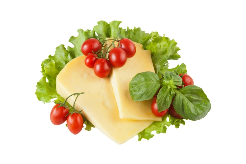 the cheese with the cherry tomatoes sits on top of lettuce