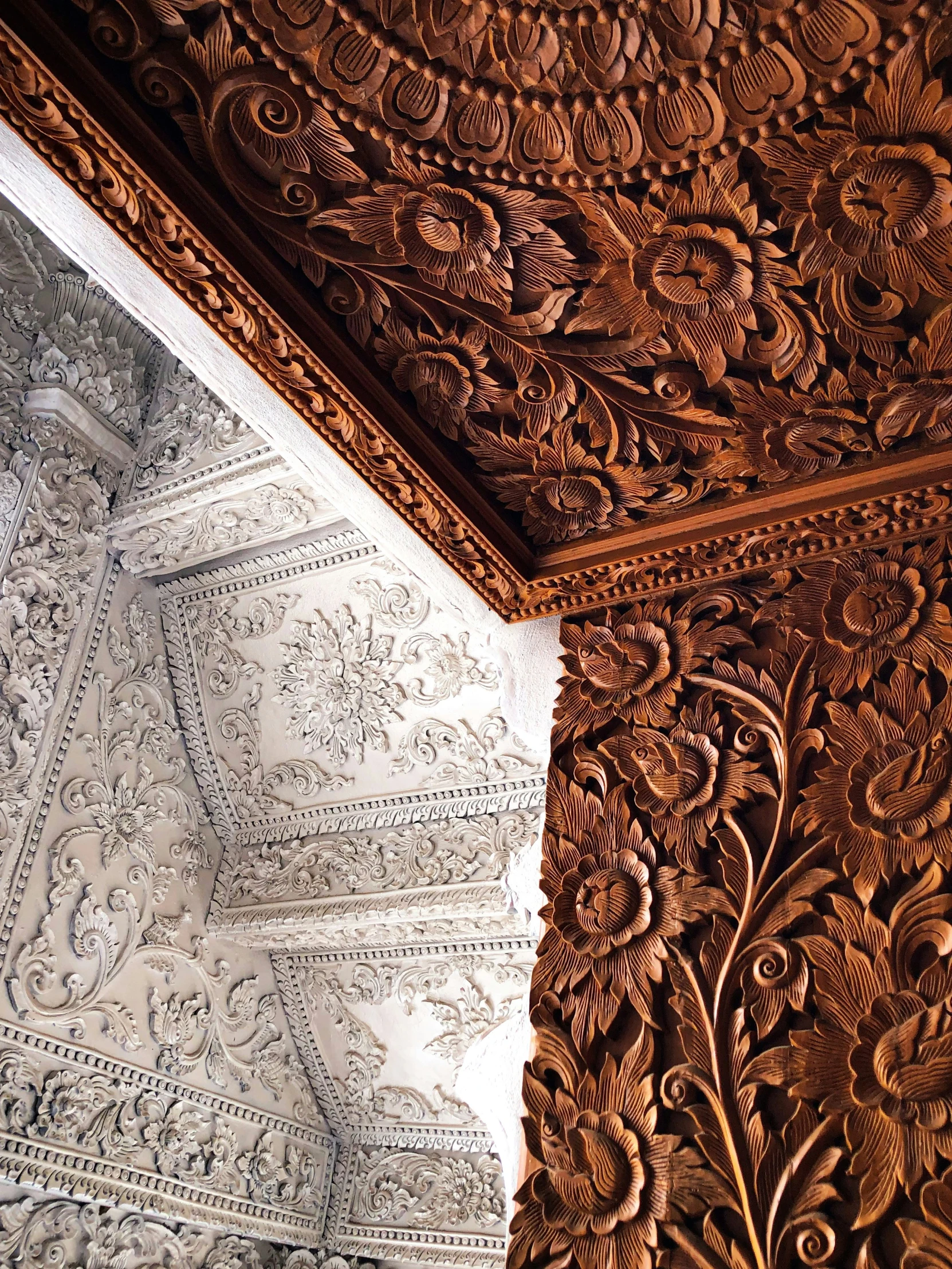 the carvings are intricately detailed and are made out of wood