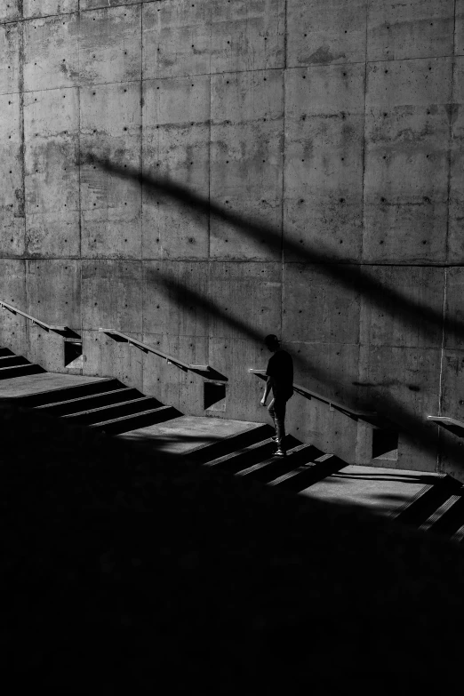 a black and white pograph of steps and a person
