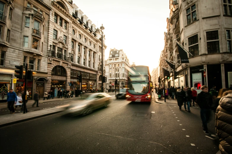 the view of a street from a vehicle moving by