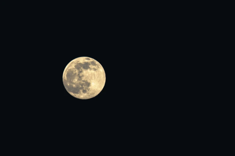 an image of a full moon during night time