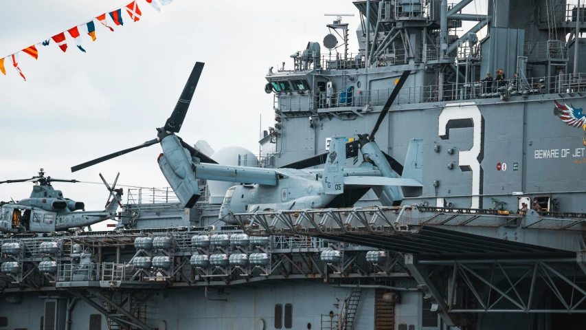 an airplane is on the carrier of a boat