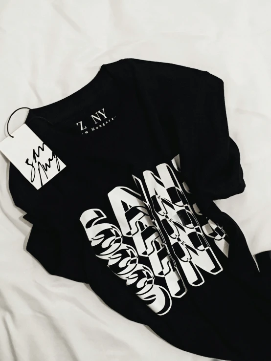 a t - shirt with black and white designs on it